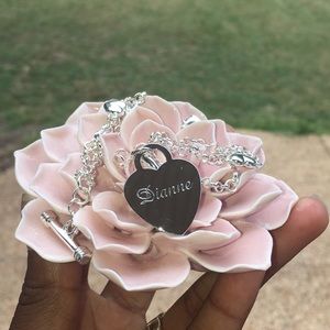 “Dianne” Silver tone charm bracelet